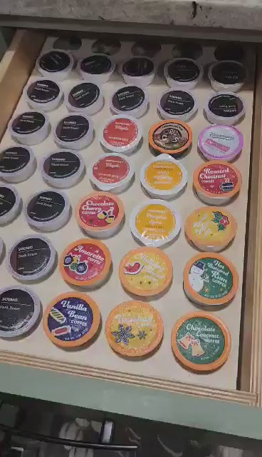 video showing a k cup coffee organizer that fits perfectly in a drawer.  the drawer opens and closes.